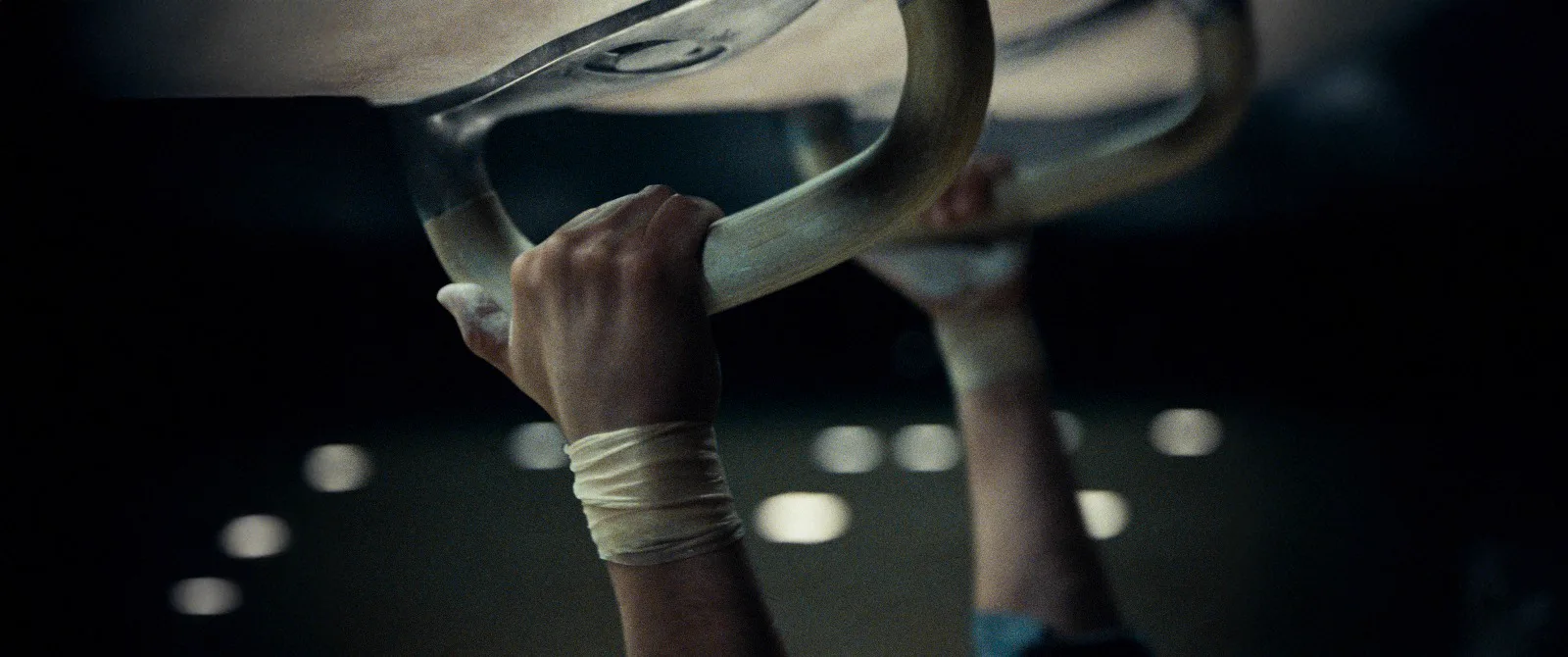 Finished widescreen frame of the close-up on Rhys's hands